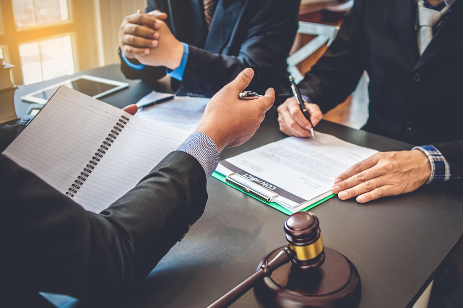 stock-photo-business-people-and-lawyers-discussing-contract-papers-legal-planning-concepts-of-law-advice-1483219064